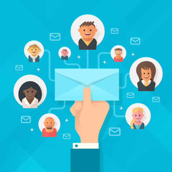 Concept of running email campaign, building online audience, email advertising, direct digital marketing. Human hand holding an envelope spreading information thought email distributing channel to  customers and followers