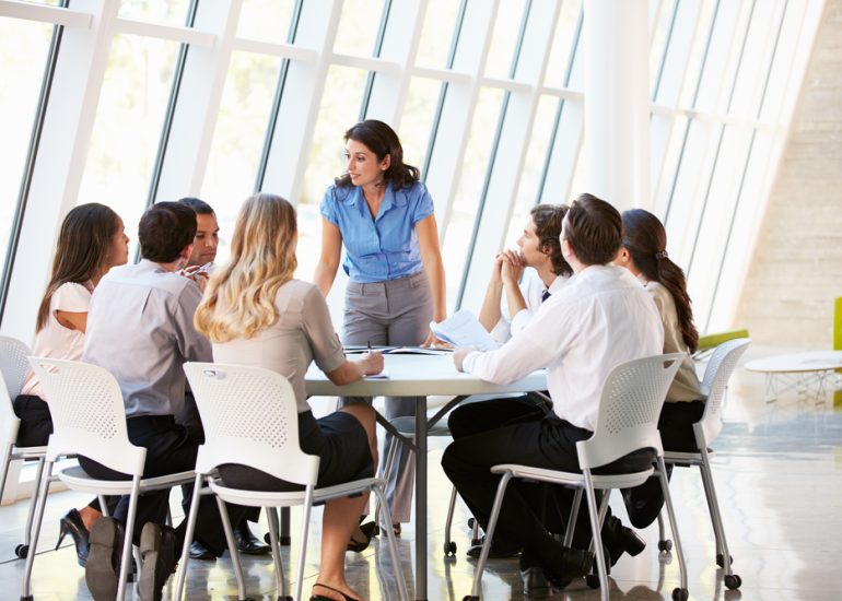 Business People Having Board Meeting In Modern Office Business People Having Board Meeting In Modern Office
